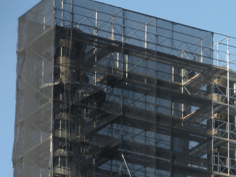 Scaffolding with containment netting